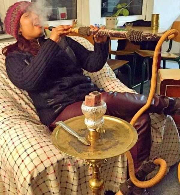 Devi Singer smoking hookah