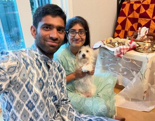 Devi Snigdha Muppala with her husband and pet dog