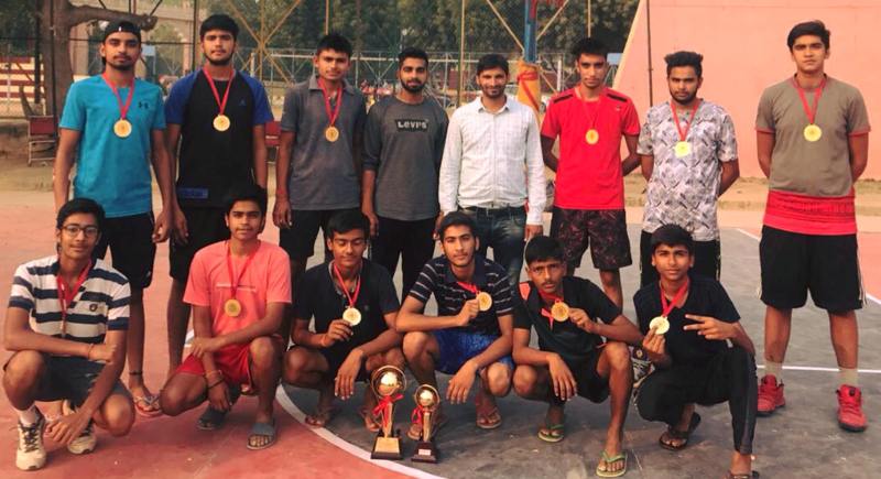 Devkaran Sharma (extreme right, standing) after winning a basketball tournament during his teenage years