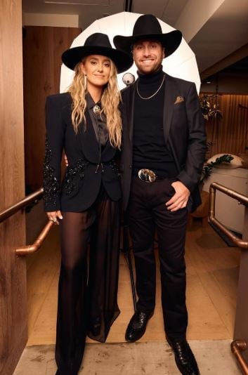 Devlin Hodges and Lainey Wilson (left)