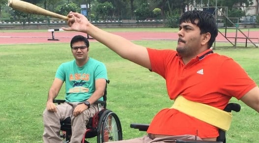 Dharambir Nain while practising a throw