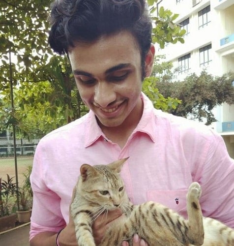 Dhaval Thakur with a cat