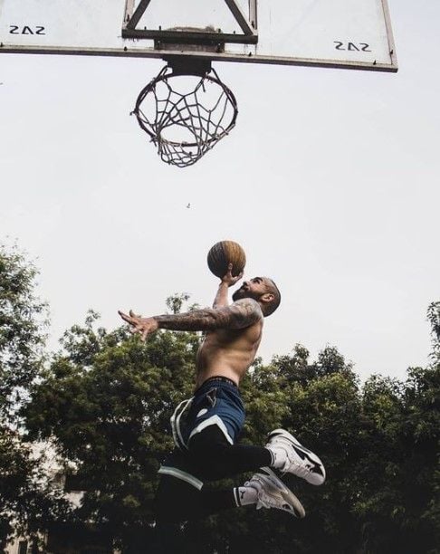 Dhruv Barman playing a shot