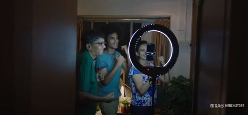 Dhruvin Busa with his parents in a still from the music video of the 2020 song 