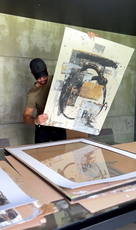 Diego de Erice with his artwork