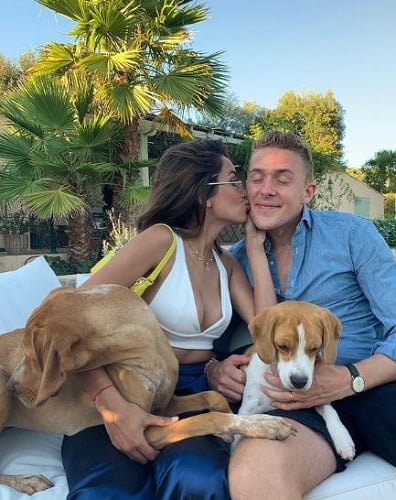 Diipa Khosla with her husband and pet dogs