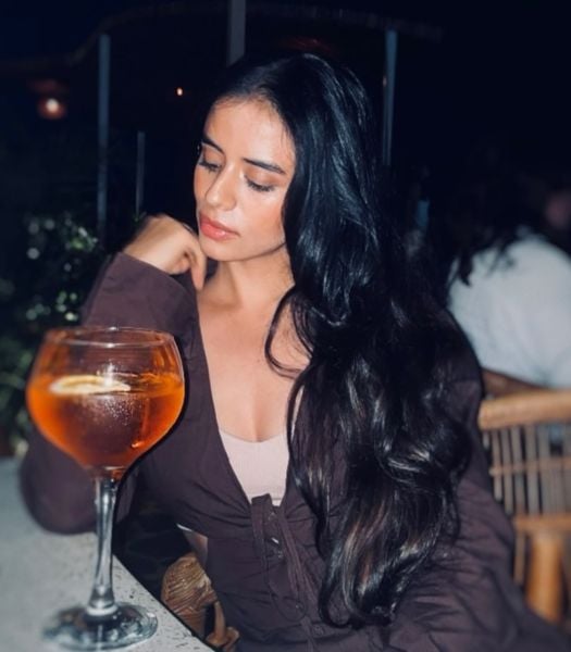 Diljot Chhabra drinking wine