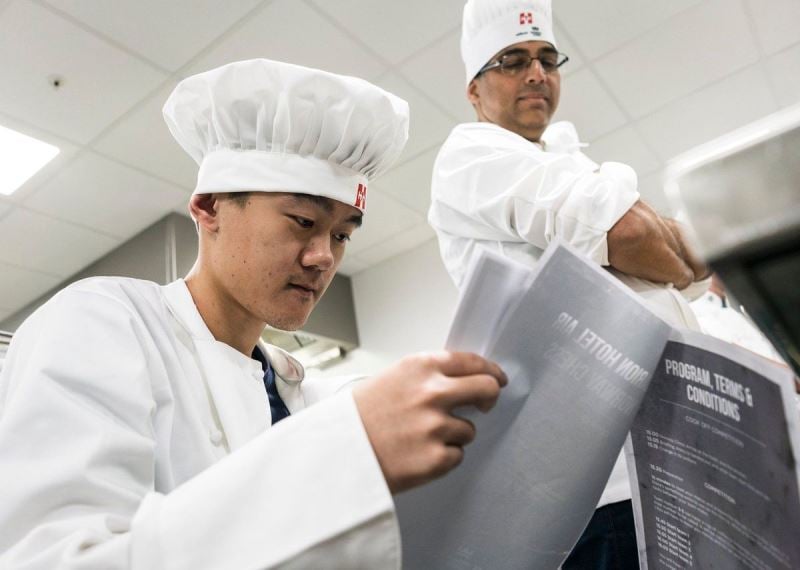 Ding Liren and Viswanathan Anand during cook-off in 2019