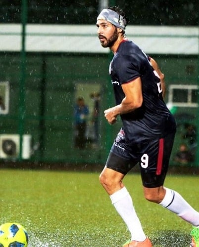 Dino Morea in a football match