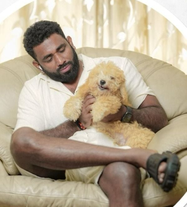 Dipak Chauhan with a dog