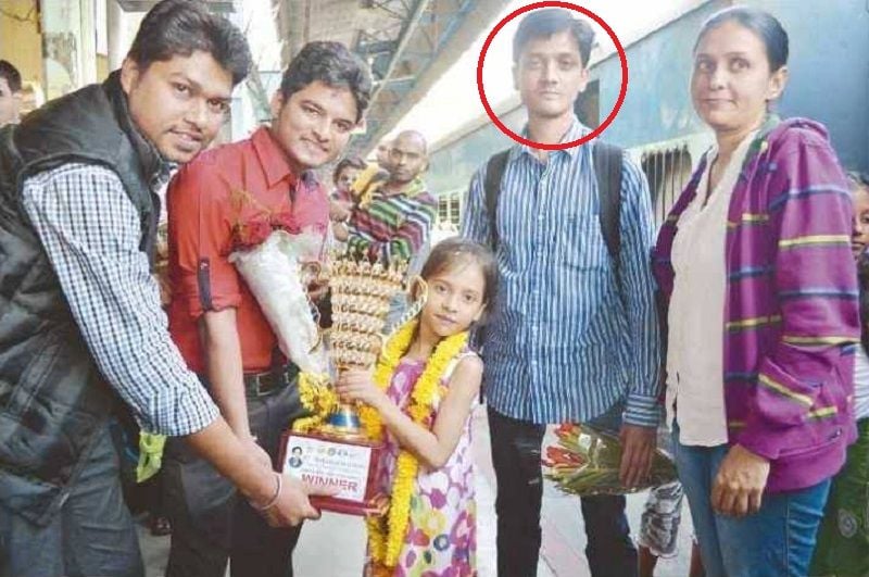 Divya Deshmukh with her coach Rahul Joshi