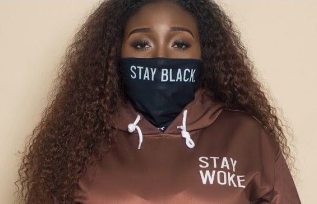 Doechii while promoting the hoodies and masks on one of her social media accounts