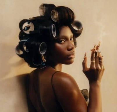 Doechii while smoking a cigarette