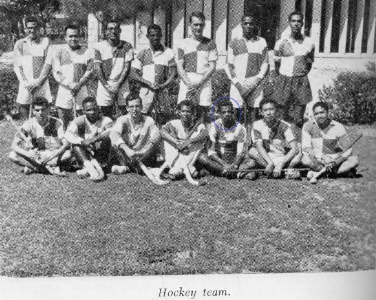 Donald J. Harris with the hockey team