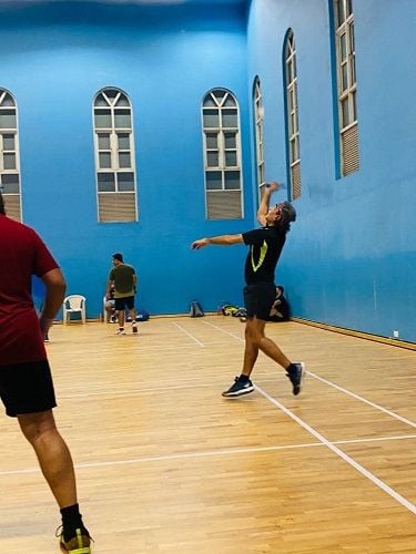 Dr. Rajesh Shah playing badminton