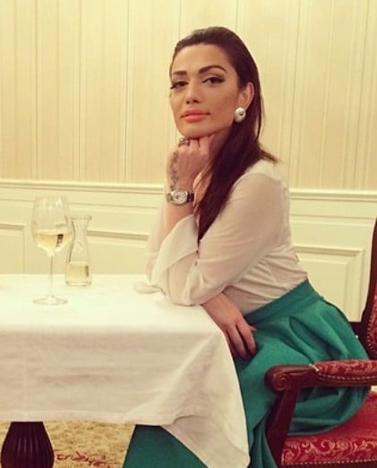 Drenusha Latifi while enjoying an alcoholic beverage