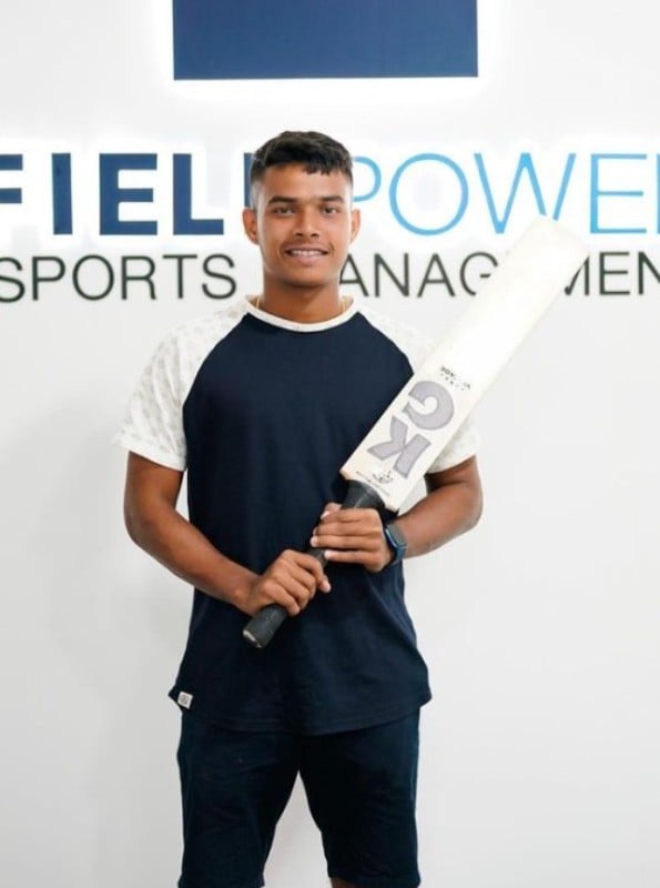 Dunith Wellalage after signing with Field Power Sports management company