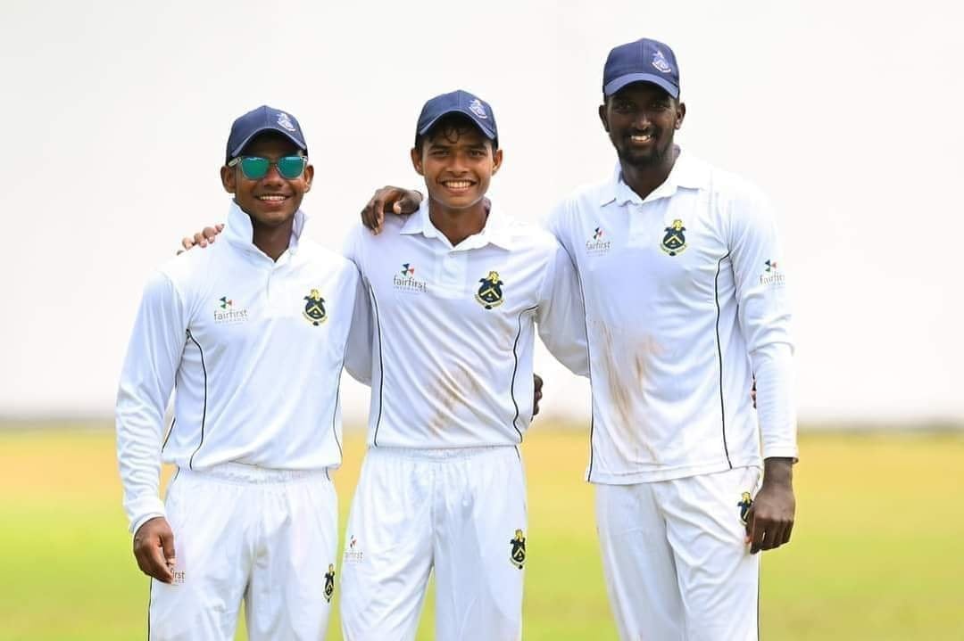 Dunith Wellalage (centre) during a first-class match