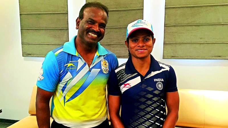 Dutee Chand With Her Coach N Ramesh
