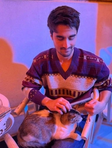 Eklavey Kashyap with a cat