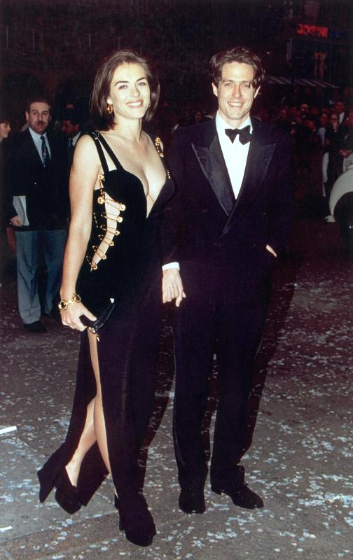 Elizabeth Hurley and Hugh Grant at the 1994 premiere of 