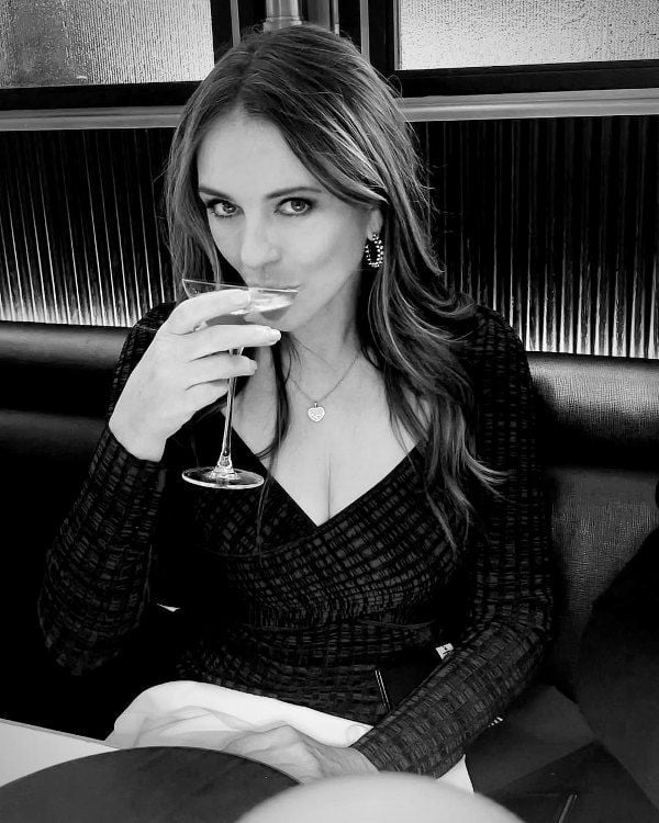 Elizabeth Hurley while having a cocktail