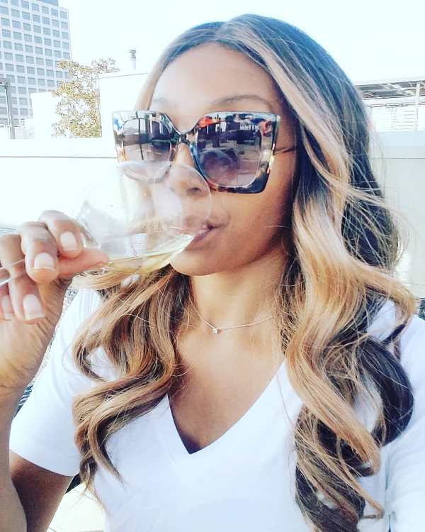 Elle young while having wine