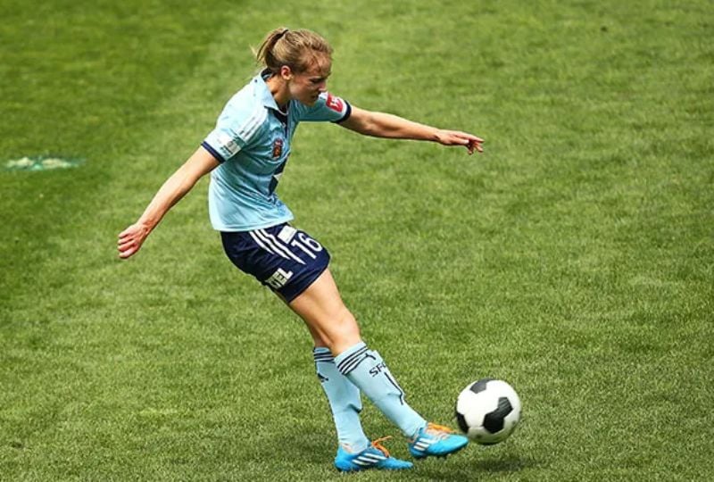 Ellyse Perry in action during a football match