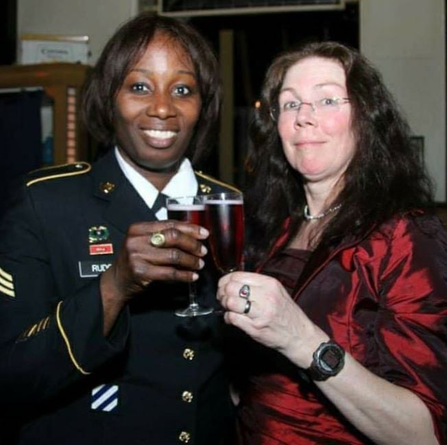 Elsa Rudge holding a glass of wine