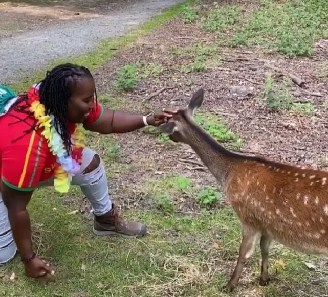 Elsa Rudge with a deer