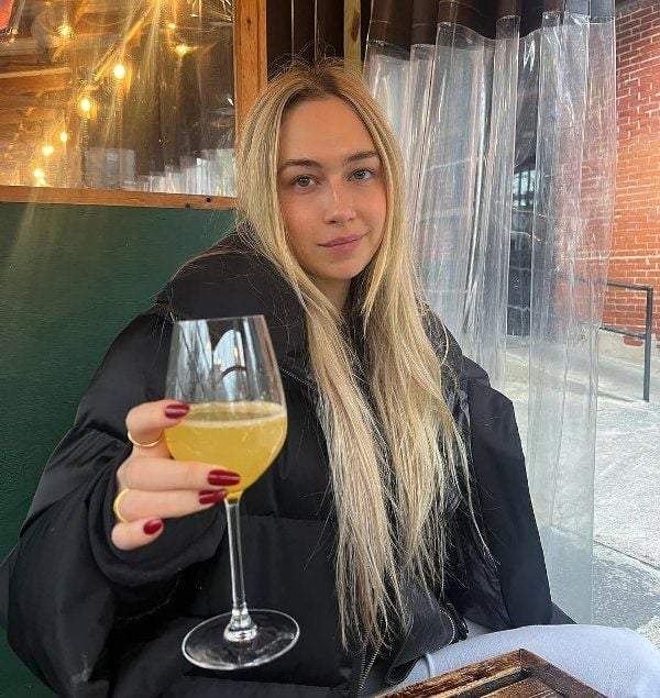 Elsie Hewitt while having a cocktail