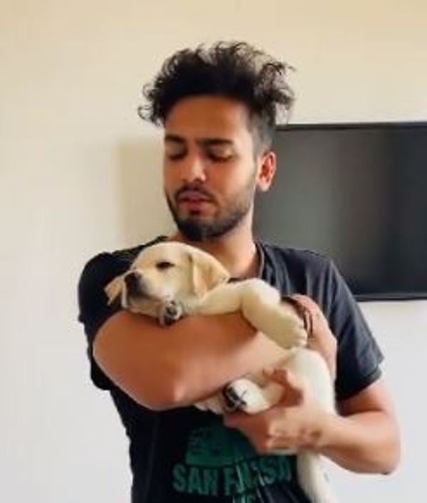 Elvish Yadav with his pet dog, Mark