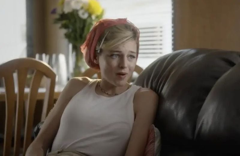 Emma Corrin in a still from the English TV series titled 