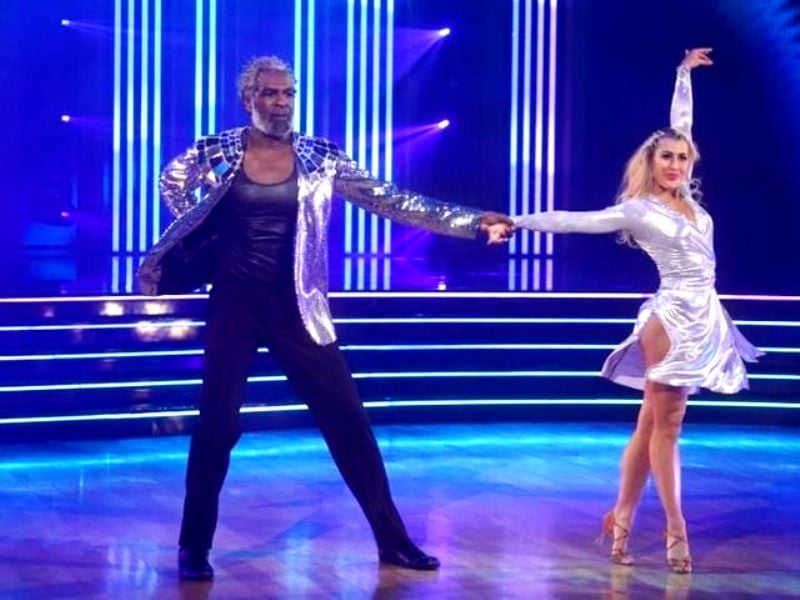 Emma Slater and Charles Oakley while performing on the show 