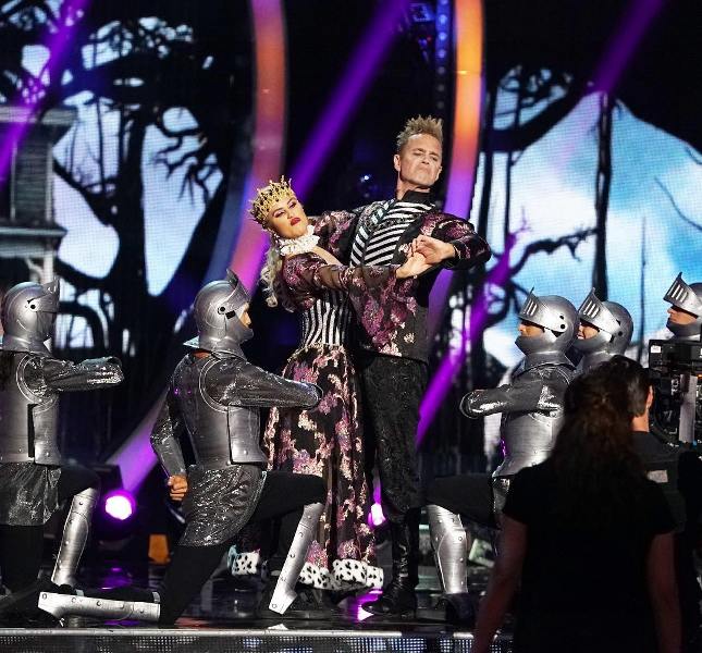 Emma Slater and John Schneider while performing on 