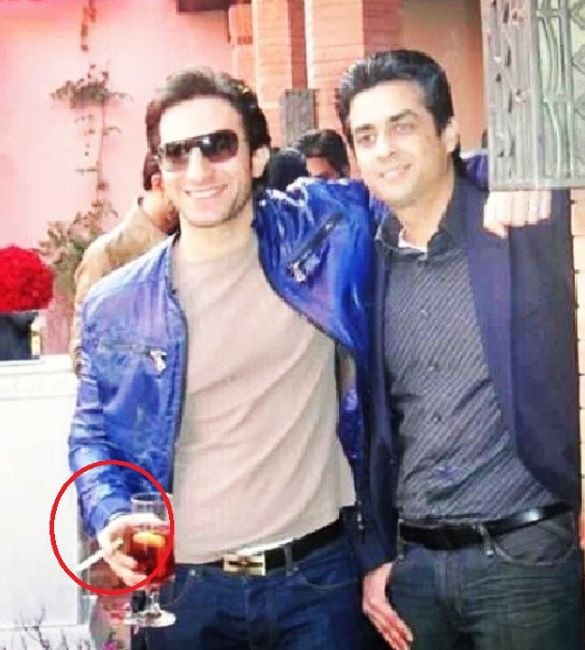 Emmad Irfani holding a cigarette