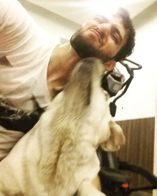 Emmad Irfani with a dog