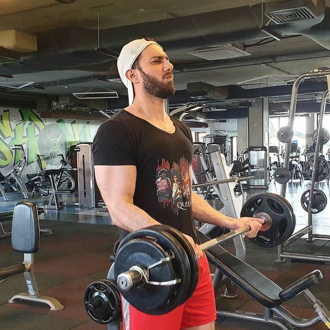 Emmad Irfani working out at the gym