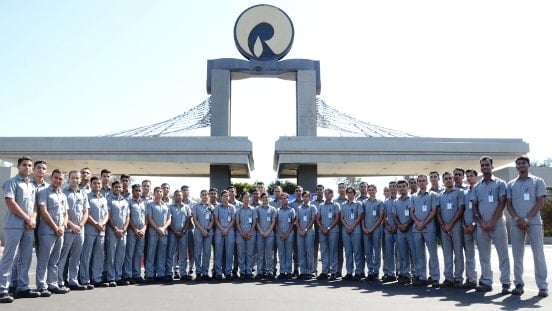 Employees of the Reliance Global Corporate Security posing for a photo