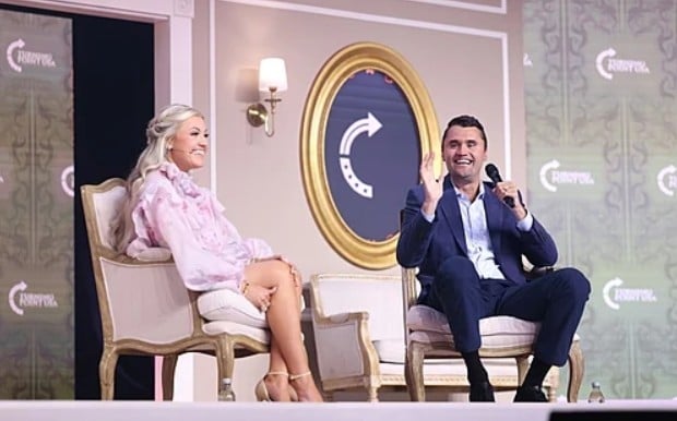 Erika Kirk and Charlie Kirk speaking together at an event in Texas in 2025