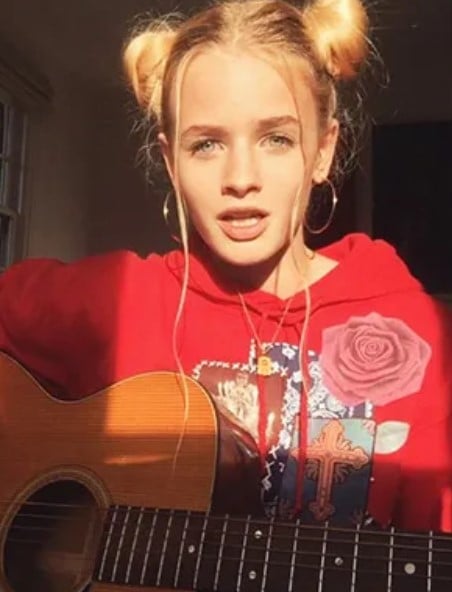 Esther McGregor while singing a song