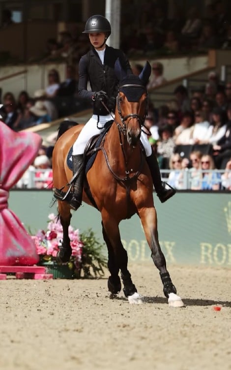 Eve Jobs during a horse show