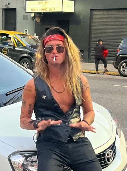 Ezequiel Ois smoking a cigarette