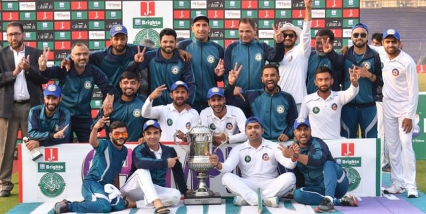 Faheem Ashraf (standing second from right) while celebrating the victory of his team during the Central Punjab
