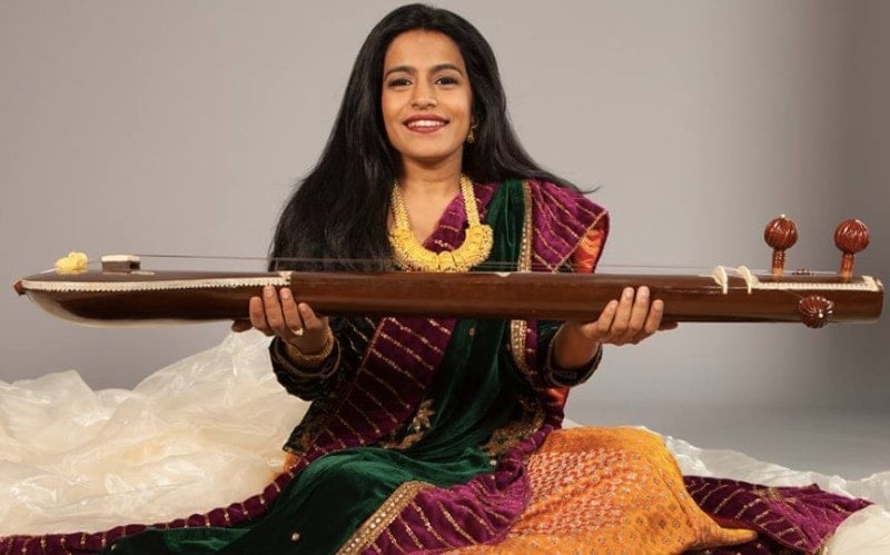 Falu with a musical instrument, Sitar