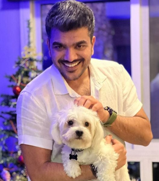 Farhan Bin Liaquath with his pet dog Max