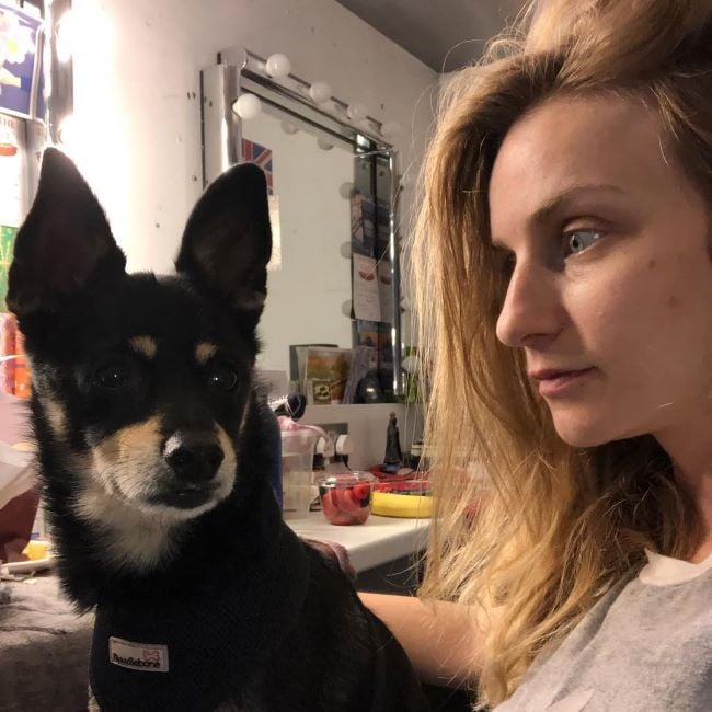 Faye Marsay holding an Australian Kelpie