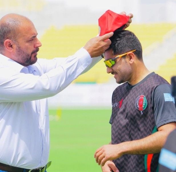 Fazalhaq Farooqi (right) during his T20I debut