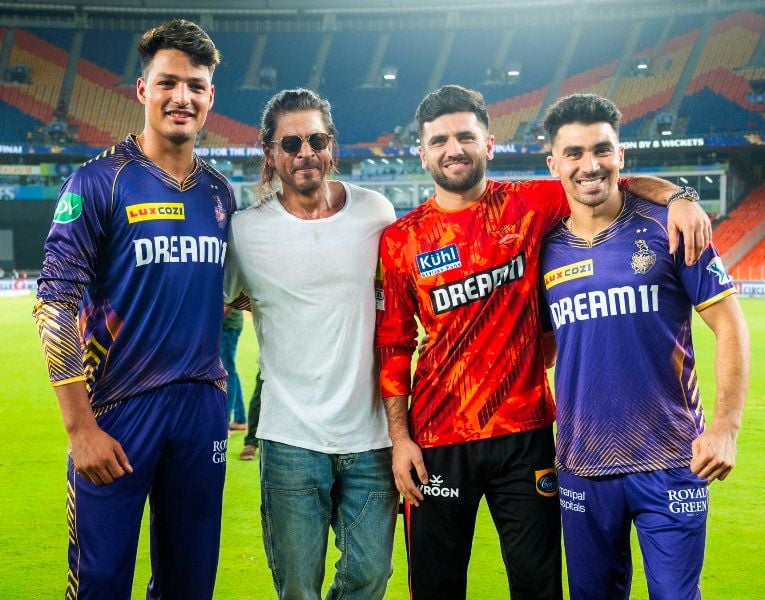 Fazalhaq Farooqi (second from right) after an IPL match