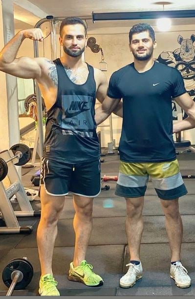 Fazel Atrachali (left) during a gym session